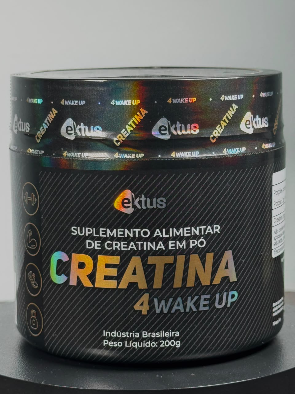 Embalagem preta de creatina com letras e lacre em Cold Stamping holográfico